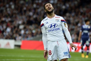 Lyon's French midfielder Nabil Fekir reacts during the French L1 football match between Lyon and Evian on May 2, 2015, at the Gerland Stadium in Lyon, central eastern France. AFP PHOTO / JEFF PACHOUD        (Photo credit should read JEFF PACHOUD/AFP/Getty Images)